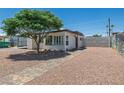 Cozy house with a well-maintained yard and walkway at 1720 Eastwood Dr, Las Vegas, NV 89104