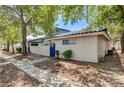 Side view of a cozy home featuring a well-kept exterior and a tidy walkway at 2028 Bavington Dr # A, Las Vegas, NV 89108