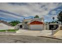 Charming two-story home with a two-car garage and a carport at 3143 El Chico Ct, Las Vegas, NV 89120