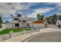 Charming two-story home featuring stone accents and manicured front yard at 3143 El Chico Ct, Las Vegas, NV 89120