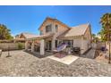 Backyard patio with brick pavers, lounge chair, grill, and covered area with outdoor seating at 3440 Meridale Dr, Las Vegas, NV 89117