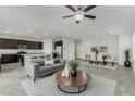 Open concept living and dining area with neutral color palette and modern finishes at 4512 Moon Hill Rock Ave, North Las Vegas, NV 89084