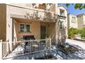 Inviting covered porch with space for seating and a grill at 7645 Interlace St, Las Vegas, NV 89149