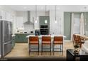 Well-appointed kitchen featuring modern appliances, a spacious island with seating, and stylish countertops at 121 Piano Ln # Lot 198, Henderson, NV 89015