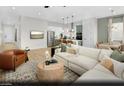 Open concept living space with kitchen, dining, and living area that is perfect for entertaining at 121 Piano Ln # Lot 198, Henderson, NV 89015