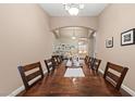 Elegant dining room featuring a large dining table and hardwood floors at 2025 Dakota Lodge Ave, Las Vegas, NV 89123