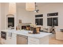 Open-concept living space showcasing stylish decor, high ceilings, and seamless flow to the kitchen at 4065 Genoa Dr, Las Vegas, NV 89141