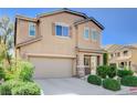 Inviting two-story home showcases a two-car garage and appealing exterior design at 7963 Cape Brett St, Las Vegas, NV 89131