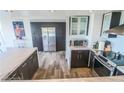 Updated kitchen features stainless steel appliances, custom cabinets, and a spacious layout for cooking at 3111 Bel Air Dr # 4B, Las Vegas, NV 89109