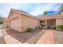 Single-story home featuring a drought-tolerant front yard with gravel and stone at 3121 Fontana Colony Ct, North Las Vegas, NV 89031