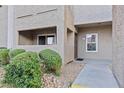 Apartment entrance with well-kept landscaping and a walkway leading to the front door at 4200 S Valley View Blvd # 1007, Las Vegas, NV 89103