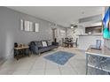 Inviting living room and dining area has stylish decor, tiled flooring, and great natural light at 4200 S Valley View Blvd # 1007, Las Vegas, NV 89103