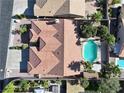 A bird's eye view reveals a private pool and lush landscaping enhancing this home at 1006 Winding Hill St, Henderson, NV 89002