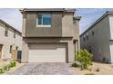 Modern two-story home featuring a two-car garage and low maintenance front yard at 1596 Pacific Baza St, Las Vegas, NV 89138
