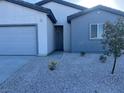 Charming single-story home with a two car garage and a low maintenance rock yard at 1905 Harvard St, North Las Vegas, NV 89030