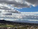 Panoramic mountain and city view featuring clear skies and scattered clouds at 358 Solitude Peak Ln, Henderson, NV 89012