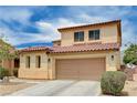 Charming two-story home featuring a two-car garage, inviting landscaping at 4308 Desert Haven Ave, North Las Vegas, NV 89085