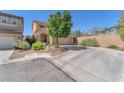 Charming two-story home with a two-car garage and well-maintained landscaping at 6247 Sugartree Ave, Las Vegas, NV 89141