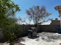 Enclosed backyard with a concrete patio, perfect for outdoor grilling and relaxing at 7850 Flagler St, Las Vegas, NV 89139