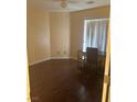 Bedroom with laminate floors, modern ceiling fan, and natural lighting from the window at 7850 Flagler St, Las Vegas, NV 89139