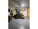 Spacious garage with storage space, gray epoxy floors, and overhead lighting at 7850 Flagler St, Las Vegas, NV 89139