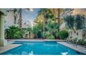 Inviting backyard pool featuring desert landscaping and lots of space for entertaining at 2104 Inverness Dr, Henderson, NV 89074