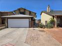 Charming two-story home featuring a two-car garage and a well-maintained front yard at 4612 Supreme Ct, Las Vegas, NV 89110