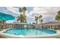 Enjoy a large backyard pool with plenty of space for relaxation and entertainment at 5217 Champions Ave, Las Vegas, NV 89142