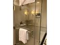 Modern glass-enclosed shower with sleek fixtures, perfect for a luxurious bathing experience at 125 E Harmon Ave # 2918, Las Vegas, NV 89109
