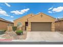 Charming single-story home with a well-manicured front yard and a two-car garage in a residential neighborhood at 4062 Vulcan St, Las Vegas, NV 89122