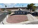 An eye-level view shows a single-story home with desert rock landscaping in the front yard at 4629 San Cir, Las Vegas, NV 89120