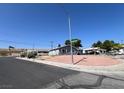 Charming single-story home with rock landscaping on a corner lot near a highway at 4629 San Cir, Las Vegas, NV 89120