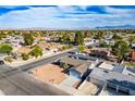Neighborhood aerial featuring single-story homes with desert landscaping and mountain views at 4797 E Imperial Ave, Las Vegas, NV 89104