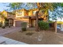 Inviting front exterior showcases a meticulously maintained yard and charming curb appeal at 6954 Jacksboro Ct, North Las Vegas, NV 89084