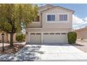 Well-maintained two-story home with a two-car garage and mature landscaping at 9029 Tumblewood Ave, Las Vegas, NV 89143