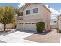 Charming two-story residence with a convenient three-car garage and neat landscaping at 9029 Tumblewood Ave, Las Vegas, NV 89143