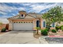 Charming single-story home featuring a two-car garage and desert landscaping in a suburban neighborhood at 2808 Cygnus St, Las Vegas, NV 89117
