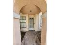 Inviting entryway with a covered archway, providing a warm welcome to residents and guests at 4805 S Torrey Pines Dr # 101, Las Vegas, NV 89103
