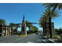 View of a street showing 'Historic Downtown' archway with palm trees and clear blue skies above at 524 5Th St, Boulder City, NV 89005