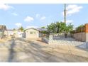 Charming single-story home with desert landscaping and a well-maintained front yard at 5453 Yvonne Cir, Las Vegas, NV 89122