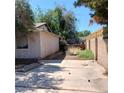 Backyard featuring a concrete patio enclosed by a brick fence at 4931 Nevada Ave, Las Vegas, NV 89104