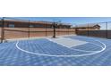 A full basketball court enclosed with fencing provides recreational activities for residents and guests at 7998 W Ford Ave, Las Vegas, NV 89113