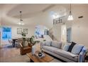 Bright living room with high ceilings, modern decor, and an open floor plan at 8104 Bay Harbor Dr, Las Vegas, NV 89128