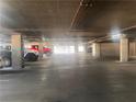 Underground parking garage with vehicles parked in spaces at 87 E Agate Ave # 202, Las Vegas, NV 89123