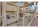 Exterior condo view with walkways, stairwells, and desert landscaping at 2007 Cutlass Dr # 0, Henderson, NV 89014