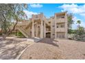 Well-maintained condo complex featuring multiple units with external staircases and desert landscaping at 2007 Cutlass Dr # 0, Henderson, NV 89014