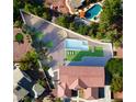 An aerial view showcasing a home with a luxurious pool and outdoor entertainment area at 276 Glenridding St, Las Vegas, NV 89183
