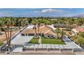Gorgeous home with a long driveway, attached garage, well-maintained landscaping, and a tiled roof at 3630 Tobias Ln, Las Vegas, NV 89120