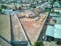 An aerial view of a home's large, fenced backyard that is ready for new landscaping or a pool! at 4878 Califa Dr, Las Vegas, NV 89122