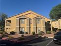 Exterior view of the property with desert landscaping and ample parking at , Las Vegas, NV 89183